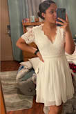 I wanted this  dress to wear for my engagement photos. I shopped last minute and I was unsure on what size to order. A lot of the time I depend a lot on other peoples reviews and the size they got and try to see who has a body most like mine so I know what size to get. However, I was so confused with this dress. It's probably just me lol but I seriously thought I could be a small, medium, or large! Obviously that's not right. So I actually ended up buying a small and a medium just to play it safe. The small ended up fitting slightly better than the medium. It was a good length. If I had slightly larger arms or bust area then the medium would have been a better fit. I have pictures of both the medium and small. Hopefully it'll help the next person :)

Photos: You'll notice the medium is a bit more loose in the sleeves, at the back of the neck since my arms is on my hip, and hangs a little lower in the front than the small. - Jaycie T.