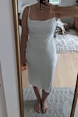 Very cute fit but this dress is unwearable. It is unlined and the fabric is very thin and completely see through. Because the back is open you cant wear a nude slip underneath. There is also a weird fold over of fabric halfway through the chest. It sticks out and cheapens the dress. Had to return. - Christie S.