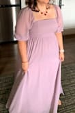 I am short and curvy and am always worried about the fit of clothes when ordering online but this dress was absolutely lovely! I ordered a Large based on other reviews and other than the length (it needed hemming, obviously) it fit perfectly. It is very flattering and the slit is a nice touch. The sleeves do fall off the shoulders quite easily so I used some fashion tape to secure them and they did not budge at all. I highly recommend this dress! - Zheni G.