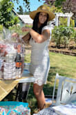 Beautiful dress for a bridal shower! No bra needed. Paired perfectly with a sun hat. The open back is a huge bonus with hot weather. Not see through at all. Very classy and beautiful! - Brenna B.