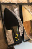 I was really excited to try these because I've seen them on others. This was a new buy for me. I regret it. It's like they combined the worst things about flip flops and flats to create this shoe. You hear the flip flop of the shoe (so unprofessional at work), the front half rubs against the top of your foot because there's no strap or anything to hold the shoe in place, and you still get sweaty toes!! HOW??? I'd return it, but I threw the box away. SMH. - Nhulu N.