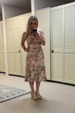 I got this for a wedding. It looked great, but honestly wasn't the most comfortable. It was tight around the butt because the inner liner doesn't give too much room to move. The rest of the dress fit perfectly though, so I wouldn't size up. It also arrived pretty wrinkled, but that's also an easy fix. - Elissa M.