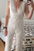 I love this jumpsuit! I'm between a XS/S and ordered both sizes to see which fit best. I'm glad I did because the XS is perfect and the S would have been too large. The jumpsuit is extremely comfortable - I tried some on that were too long in the front or uncomfortable to bend, but this seems to be just right for my body type. - Kristen M.