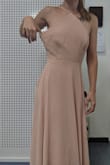 Overall too big for a double extra small.
I'm 5.2 and I weight 101 lbs, I'm very petite but I'm not underweight (I look thicker than the model in the photo) but it was still too large on my waist and breast (I want to specify that I looked at the size chart before purchasing it).
I expected it to be too long, but the dress seems made for a 6 ft model. it is excessively long! The average height for women in the US and Europe is 5.4! Getting the dress fixed for my body would cost a lot of money and I have already spent over 100 euros on this dress between initial price, shipping, and taxes.
I also wouldn't recommend this color if you have fair skin (it's summertime here in Italy and I have a light tan but the color still doesn't look good on me). - Chloe S.