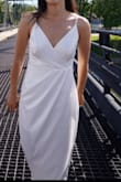 Fit perfectly. I personally wasn't a big fan of the sash/bow, so I removed it. Looked and felt great. Simple and classy. Very nice material, but it wrinkles easily. I used my steamer to get them out and it was just fine. - Megan K.