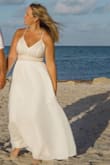 I loooove this dress! I got it to wear for a beach elopement and it was perfect. I'm 5'6 and ordered the medium and it was extremely long so I had it hemmed several inches but otherwise it's perfect! - Gillian B.