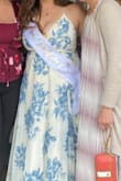 Love this dress and received so many compliments! Highly recommended! I'm a L - XL so finding a good size is hard because of my bust. I wish I would've ordered the XL instead because I ended up getting sewn into it for my bridal shower, overall still very beautiful dress and well designed! - Jacquelynn C.