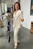 I absolutely loved this blazer and pant combo for my rehearsal dinner outfit! Received so many compliments! Was worried about the texture/if it would be see-through but not at all! The color was also great- I am extremely fair so white white is not for me, this cream color was so gorgeous! Fit so well, did not need to get it altered! Would highly recommend to anyone looking for a suit for their wedding! - Jennifer G.