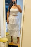 Planning to wear this for a rehearsal dinner in Mexico(. The fabric is so breathable and light, this set is perfect for hot weather/summer. To my surprise the skirt is a bit loose, but not enough that it's sliding down. The top fits great. I'm usually a true XL so just beware with sizing that skirt runs a bit big! (It also has some stretch, so does the top)

The pic is straight out of the box, this one definitely needs a good steaming. But so cute! - Gina B.