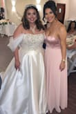 Dress ran a little small up top but waist down is very forgiving. I had to order a size up and return my original dress. It was also very long for my 5'3 height so I had it shortened. I got a ton of compliments and I felt good in it. - Priscilla G.