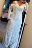 This dress is beautiful, it is romantic and elegant in a simple classic way, I can't wait to see all putting together in my vows renewal. The dress falls so nicely and flatters my curve body. It fits a little big, but I took it to the tailor and a easy, quick fix and now it is great. - Margret H.