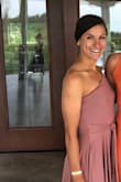 Was very comfortable and perfect for a summer wedding! Got lots of compliments and loved that it is a romper! I do wish I had some double stick tape to help keep the side up without the strap which would probably have to be re-applied after each bathroom trip. The fabric wasn't very forgiving of sweat but thankfully it was a cooler night! - Bethany K.