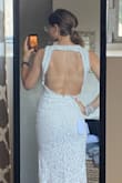 This dress is incredible! I bought it for our 10-year anniversary vowel renewal and photoshoot and can't wait to wear it for that special day! I was so impressed by the quality and fit when it arrived and loved the inclusion of a traveling dress bag. I'll have to have it taken in in the bust a bit, but other than that it fit like a glove. I love that it has just enough stretch to hug curves in the best way. Highly recommend - Rochelle S.