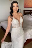 This dress was perfect for my beach wedding. The back straps make it adjustable and I ended up shortening the inner layer, while keeping the outside lace layer as a mini train. It's sexy, fitted, and easy to dance in. - Fariba A.