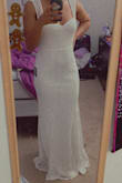 The dress is perfect. One thing though in this picture I didn't have heels on. With heels the front is a little bit short which was a bit disappointing but it's okay. 

I love this dress!! - Peta P.