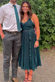 I am in love with this dress! I fell in love with it the second I saw it online. Unfortunately, the only size available was a small. I am always a standard medium and typically never size down, so stick to your regular size. Other than wearing the wrong size, the dress was perfect. I received so many compliments and have never felt so beautiful in a dress!! - Claire P.