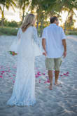 This dress was exactly what I was looking for my Key West beach elopement! I normally wear a size 8 but am busty so I went with the Large and it fit quite well. The lining can get twisted around so I attached the lining inside the dress which made it much easier when walking. If you love this dress just get it! You won't regret it! - Lisa H.