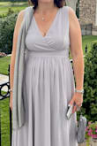 I wore this to a formal Friday evening wedding. I loved it. The high waist hide all of my bulges and I was able to get away with a small tummy tucker. The length was perfect. I mean really perfect. I am tall and never find dresses that are supposed to be floor length that are long enough. This was a hug plus. The material although lined, showed bra straps, etc. I ended up getting a smooth no line wireless bra that was perfect. no bulges. this dress was perfect in my opinion. I felt really comfortable and classy. The slit was also high but perfect for my long legs. - Lorraine K.