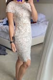 I bought this for a potential bridal shower dress, but ended up going with an ASTR one instead. I ordered both a medium and a large, and the medium fit perfectly. I usually wear a 6 in dresses. The length is good too for us taller girls! Ultimately, returned because it felt a little juvenile for the look I wanted. - Katie S.