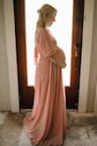 I'm 30 weeks pregnant and just used it for my maternity pictures! I ordered a XS and even with being pregnant it was perfect! - Evelyn G.