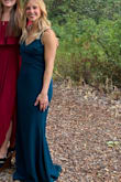 I absolutely loved this dress for my cousins wedding & received so many compliments! The color was more of a teal than green, but still a beautiful color. I loved the way it fit and accentuated my body. The material is thick so it feels more expensive, but wasn't heavy. The only downside was the length for me, even in heels it was quite long. - Sarah H.