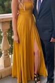 Wore this to a summer wedding and absolutely loved it! Only down side is that the slit goes all the way up to the waistband, so definitely need to be careful with the wind! - Dina E.