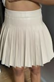 I read about this being a good dupe for the Aritzia Olive leather skirt and I was not disappointed! There are a few distinct differences (Lulu's pleats are narrower and the zipper is on the side instead of the back), but the quality is there. Vegan leather is so soft and the cream color is versatile. I sized up because there isn't any stretch. - Nicole D.