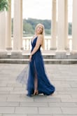 Used for my engagement photos. The tulle movement was beautiful, and the material was light and not cumbersome. I did have to trim the tulle/hem the front fabric by about 2 inches though. Otherwise fit perfectly. - Dana F.