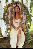 I ordered this dress initially in the XS in the black floral for a bridal shower and loved it so much that I went back for the white color for my bridal shower. Very flattering, true to size. You will receive endless compliments! - Sam O.