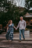 I bought this dress for my engagement photos and absolutely loved wearing it. It was comfortable, flowy, and photographed beautifully. I did have to have it hemmed quite a bit as I'm very short, I would also recommend sizing up if you have a large bust. I also had my seamstress tack the split sleeve so that sleeve fell nicer on my shoulder and arm. Overall, very happy my purchase!! - Lindsay S.