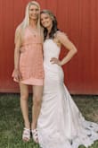 Pulled it off as a wedding guest dress. Do not wash and dry it will shrink! Last minute I was running around trying to find a slip to wear under it for length! - Amy P.