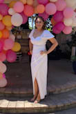 This dress was perfect. The fabric is thick and beautifully draped in all of the right places. - Jessica H.