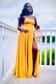This dress is absolutely stunning! The yellow color is more beautiful in person. I wore this dress to a summer wedding and it was perfect! The dress is also well made and the material is sturdy but light. I wore this dress with heels and the length wasn't a problem. - Sherilyn C.