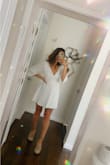 I love this dress!! Wore it to my sisters bday lunch at a fancy restaurant and it fit the vibe perfectly. I love how the sleeves flare open at the ends and love how flowy the skirt portion is!! It's just sliiiightly see through so I wore pasties, but I was kind of expecting that since it's a white dress. Bottom portion is fine though! - Ivy O.