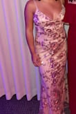 This dress fit perfectly and made me look amazing. I had to get some fabric hemmed off of the bottom but other than that I got a lot of compliments on it ! - Donna K.