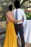 I wore this dress to a wedding and it was perfect. I got so many compliments. I wore flats and the dress was a but long, but it covered by shoes that is what I was looking for. The dress is a bit heavier than I expected with a couple layers but was still very easy to move in. Would definitely recommend. - Sarah N.