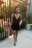 I absolutely fell in love with this dress when I first saw it online.  The incorporated shorts help to "excuse" the fact that the dress portion is short and instead, makes it super flirty without being inappropriate.  I wore my 5.5 CL pumps with it and felt so hot!! Hubby loved it too! - NC T.