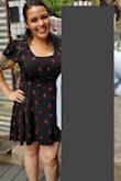 I've been absolutely obsessed with my dress purchases from Lulus. The fit is always so on-point! A random lady stopped me on the sidewalk to ask me where I got this dress, which NEVER happens to me!

Dress material is a bit on the heavier side - not fall-weather-heavy, but definitely not breezy or sheer.  Feels really high quality. There's no give at the waist, but the XL fit me like a glove. I have athletic arms, so armholes are sometimes a problem for me, but they were no problem on this dress, and the cap-sleeves are adorable. 

Neckline is definitely a bit of a plunge, but I was able to tone down the sexy for a family outing by throwing a black tank on underneath. 

Length fell to just above mid-thigh for me. As I am blessed with a sizable booty, I prefer to wear black bike shorts underneath so I'm not concerned about giving people a free show if the breeze picks up. 

The cherry print is precious! Looks great with sandals, white sneakers, whatev! - Amber B.