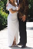 I wore this dress for my civil wedding. It fit perfectly and I got so many compliments from people I didn't know.
It's stretchy material so I ended up buying a size smaller (xs)
I have had 3 children so I have to wear compression undergarments for my stomach. In the photo uploaded I was wearing nude compression undergarments and you can't even tell!
The prettiest / simplest dress! - Alicia C.