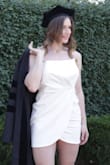 This dress was great for graduation photos! I'm usually between a M or L and most often size up due to my athletic build. While the waist was a bit looser than anticipated, it was great for my hips and bust! The fabric is sturdy and not see-through and breathable at the same time. Retains its shape while allowing you to move. Highly recommend. - Alexandra A.