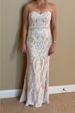 Didn't wrinkle in shipping, so I expect it will travel easily for a destination event.  I usually wear a 4/small, but definitely needed the medium in this dress. Length is perfect with 2.5" heels. - Lisa M.