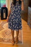 I love this dress-- I bought it for an engagement party, but I also think I can dress it up for an outdoor wedding. The only thing is it is very long for anyone who is petite like I am. The top of the dress fits perfectly, but it was very long and wide on the bottom (it has a double layer of fabric) so I had to have it hemmed. For me, it was worth spending on the hem to get a few wears out of it. It's great quality for the price. Picture is after the hem! - Julianna I.