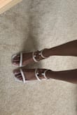 I love these shoes. They are very cute but they were not made for narrow feet. All three straps do not fit around my feet. When walking I feel like my toes are clinging on for dear life. - Brittany T.