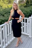 Absolutely love this dress. Super comfortable. Form fitting but stretchy & slightly ribbed. High neck with the cut outs & slit make for a classy but sexy, not trashy look. - Jean C.
