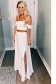 I love this dress! I got so many compliments! I ordered a small and a medium. Returned the medium because the top fell right off. The skirt portion is long so you have to wear wedges or heels with it. - Brooke C.