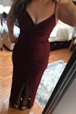 This dress is amazing ! I didn't have time to exchange it for a smaller size so it was a little big on the chest and hip area. It fit great and the touching was so flattering! Need to keep an eye on the chest and slit due to sizing. - Stephanie G.