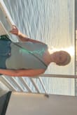 I love this top! It looks and feels like good quality clothing, and the color is beautiful. It's simple and feminine, and the back detail is the cherry on top. - Natalie