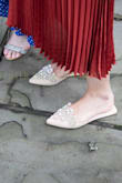 First of all, these shoes ARE as cute as you think they are and you WILL be getting compliments on them all day. That being said, they are a bit cheaply made and it shows. Before I even left the house, one of the pearls came off (all the bobbles are basically just krazy glued in place). Turns out this happens anytime your shoe even lightly brushes up against something (your other shoe while walking; a piece of furniture). Other beads/rhinestones came off during the day but I was (shockingly) able to find them on the floor each time time and stick them back on. If I had seen these in person before making the purchase, I probably wouldn't have been willing to pay $38 for them. Maybe if they were on sale I'd have paid (max) $25. - Michelle H.
