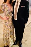 This dress was the perfect length for me and was light enough to keep me comfortable throughout a hot July wedding in Atlanta. The colors of the dress looked amazing and unique, and the feel of the fabric felt high quality. My minor complaints would be that the neckline plunged too low for my comfort at a conservative wedding but was easily solved by putting in a tiny snap closure. I probably could have sized up as the waistline was a bit tight as well, but never to the point of discomfort. Tons of compliments, and a very happy wedding guest. - Emily P.