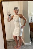 The only reason I did not give this dress 5 starts is because the lining material is not attached to the dress itself other than at the top area. So when you move in the dress, the lace portion rides up and shows the lining material. I manually stitched it at each seam on the sides and in the back. It helped a little, but not a true fix. Unfortunate that I have to worry about continually checking and pull that area of the dress back down. - Dawn G.